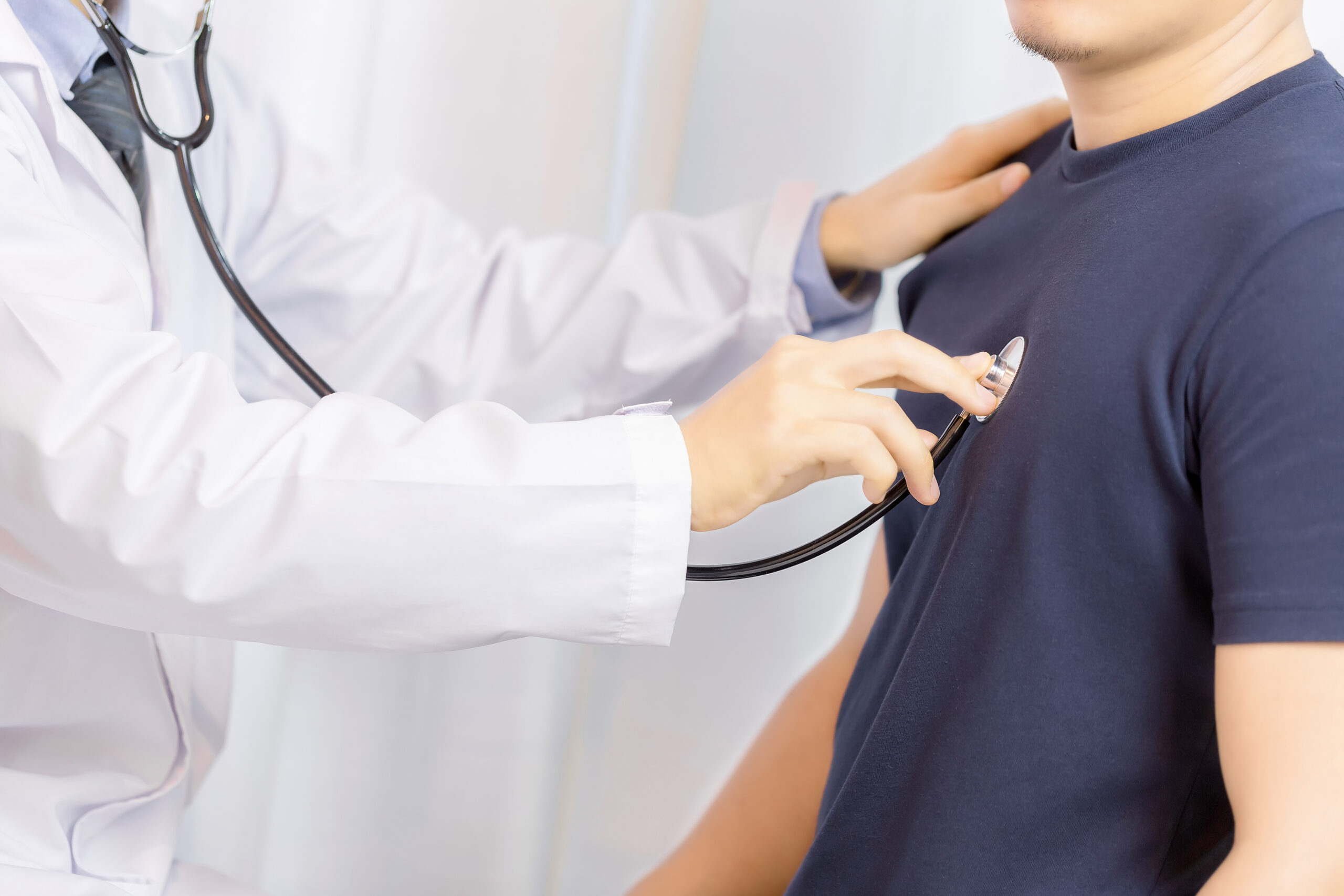 doctor-examination-young-man-with-stethoscope-hospital-scaled.jpg