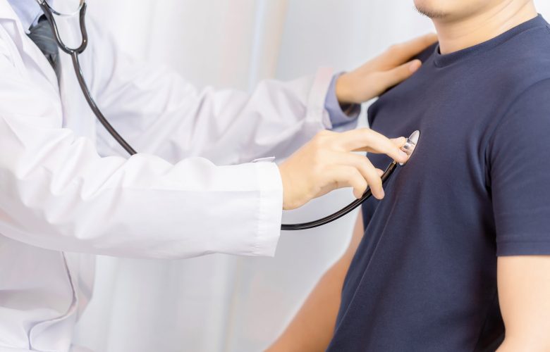 doctor-examination-young-man-with-stethoscope-hospital-scaled.jpg