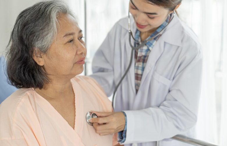 doctor-examining-senior-elderly-female-patient-hospital-bed-patients-medical-healthcare-senior-concept_1150-21712.jpg