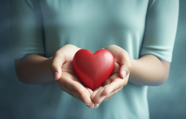 woman-holding-heart-shaped-object-scaled.jpg